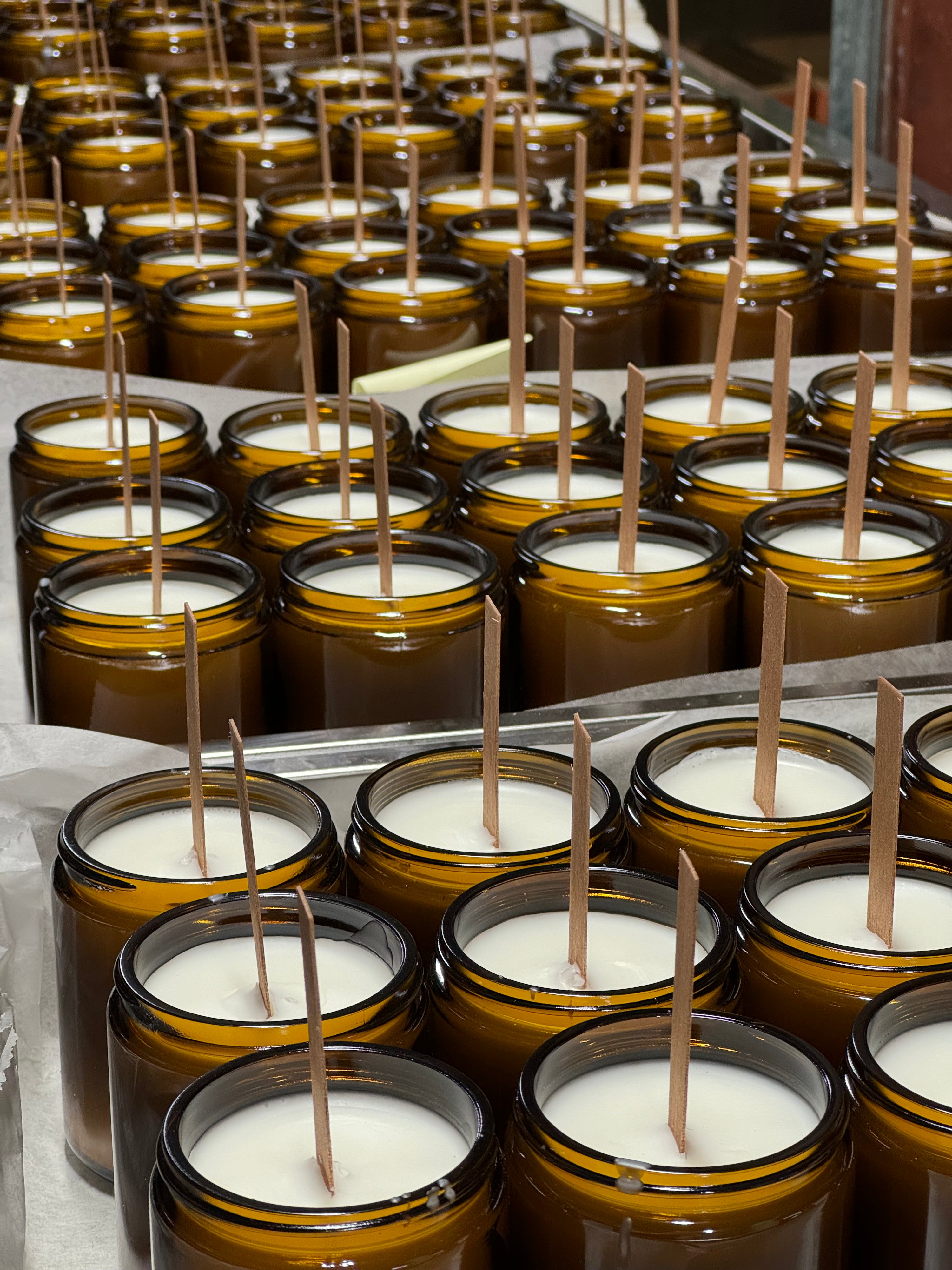candles being poured in jars waxhouse